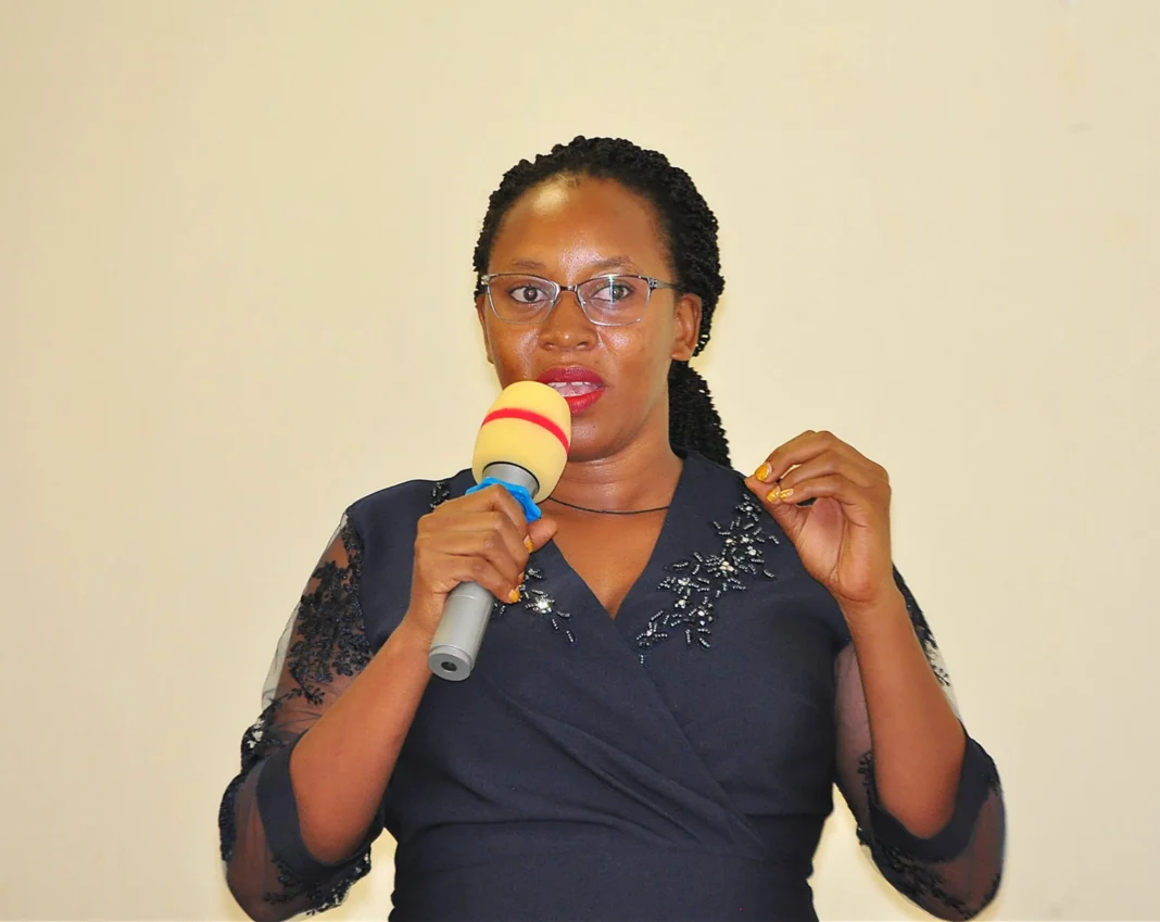 the madam holding a mircophone