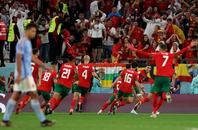 Morocco players celebrate historic 5–0 victory over Niger to become first African nation to qualify for the 2026 FIFA World Cup.